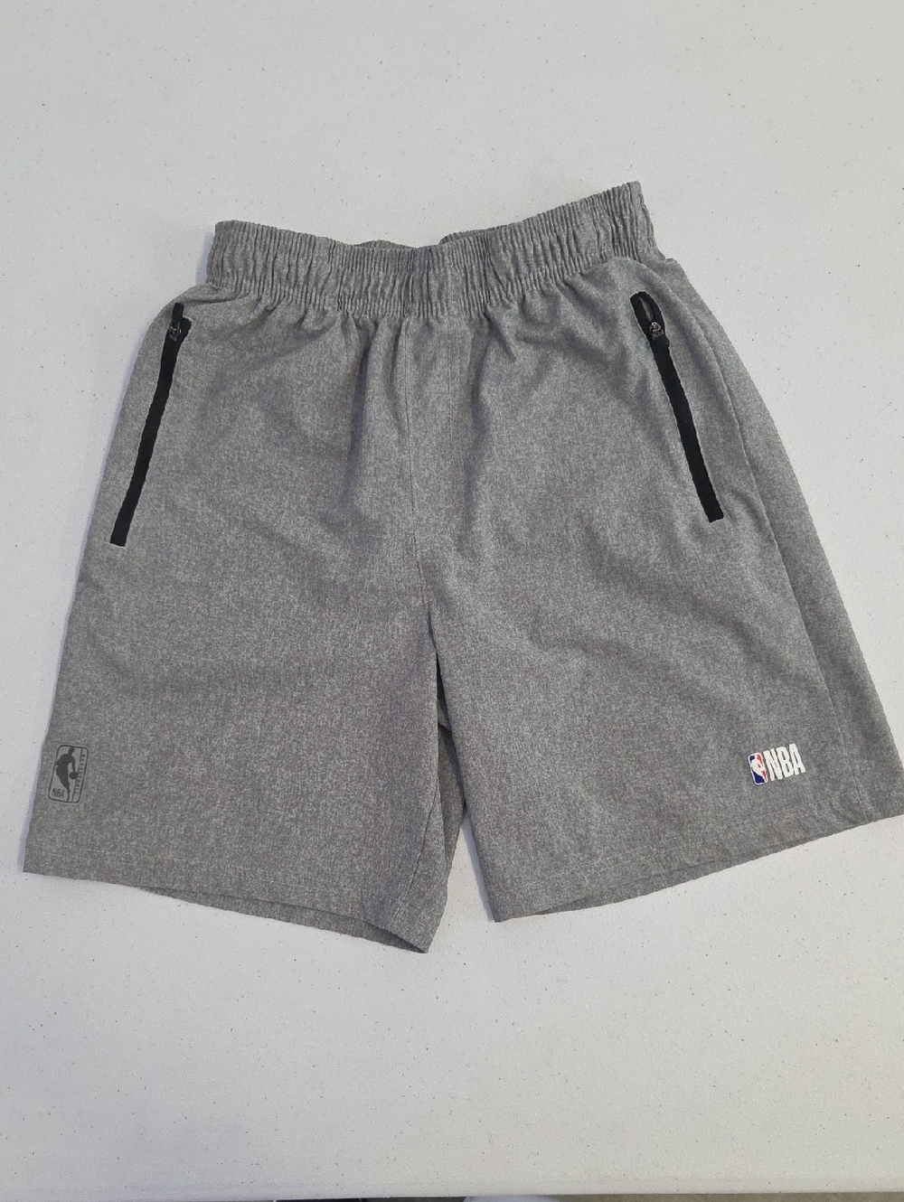 NBA Boys Gray Athletic Performance Shorts with Black Zip Accents. Size 14-16